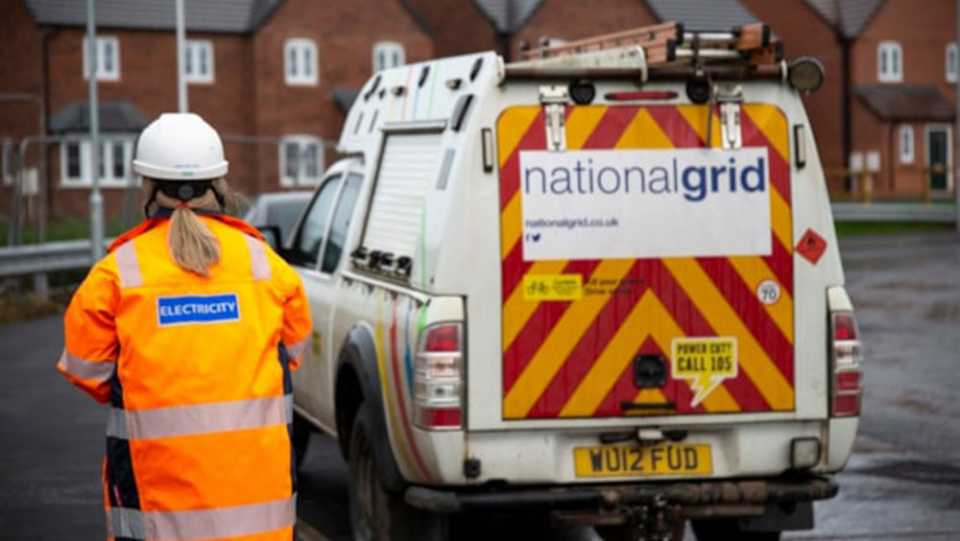A National Grid van and an engineer.