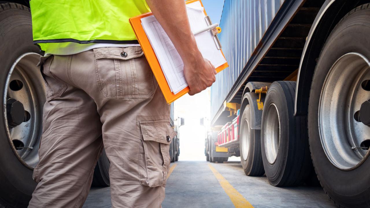 Man in front of truck