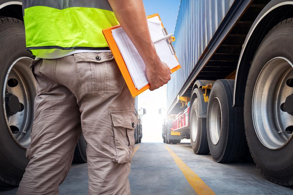 Man in front of truck